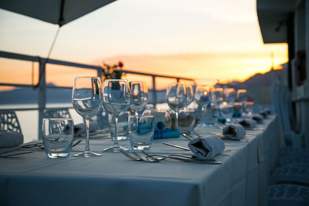 A group of tables at a restaurant that was funded with Restaurant Equipment Financing, glasses, restaurant, drink, equipment finance