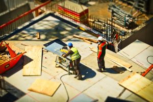 Construction workers working on a project funded with working capital loans