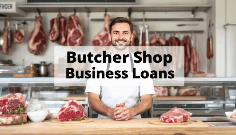 Butcher Shop Business Loans - A friendly local butcher stands behind the counter of an artisanal butcher shop, ready to greet customers, with a glass display case showcasing various cuts of meat. The image features a transparent overlay with the title “Butcher Shop Business Loans,” emphasizing the importance of financial assistance and business loans for butcher shop owners and small meat processors.