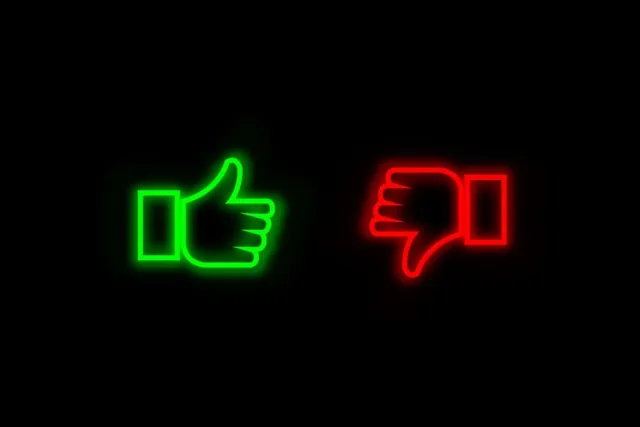 Neon green thumb pointing up and red thumb pointing down on black, the pros and cons of Innovation Refunds